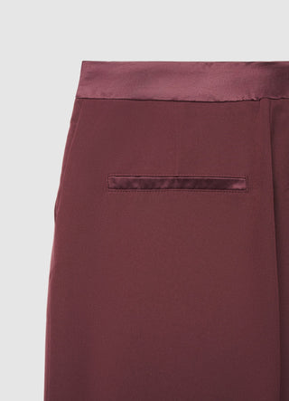 Flared trousers with a satin waistband