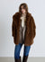 Manteau mi-long effet fourrure avec ceinture