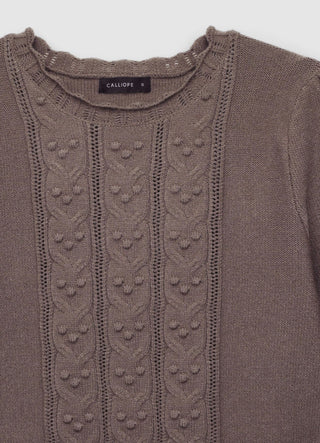 Sweater with cable knit and ruffles