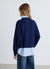 Maglia con inserto camicia e scollo a V