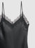 Top asimmetrico similsatin con profili in pizzo