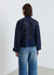 Blusa in pizzo con fiocco al collo