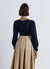 Cable-knit body with long sleeves