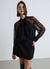 Blusa con fiocco e maniche in pizzo