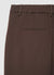Trousers with pleats and elasticated waistband