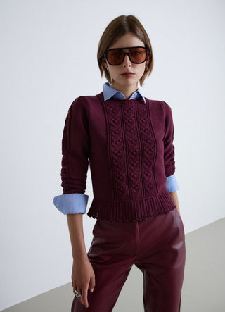 Sweater with cable knit and ruffles