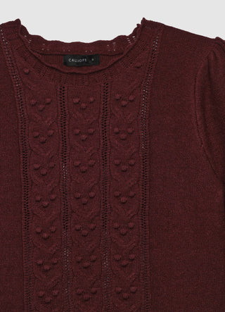 Sweater with cable knit and ruffles