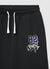 Jogger trousers with basketball print