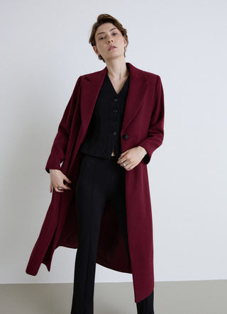 Long coat with single-button closure