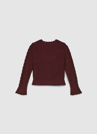 Sweater with cable knit and ruffles