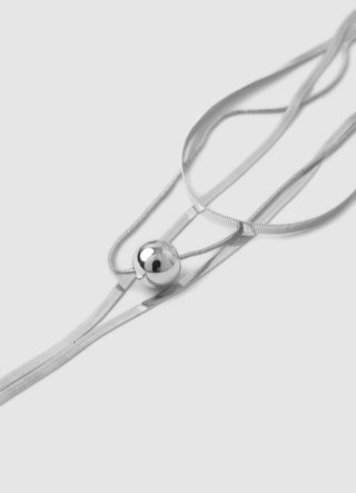 Long three-strand necklace with sphere pendant