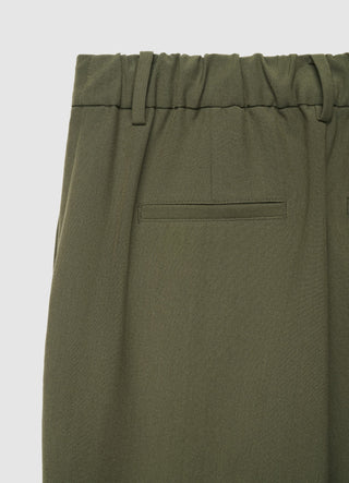 Pantaloni con pinces e vita elasticizzata