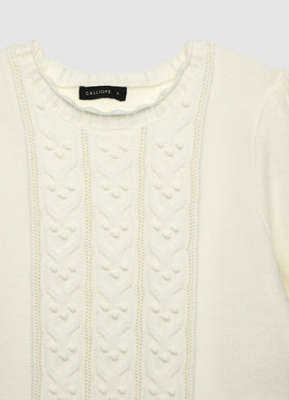 Sweater with cable knit and ruffles