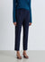 Trousers with pleats and elasticated waistband