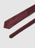 Tie with a geometric micro-pattern